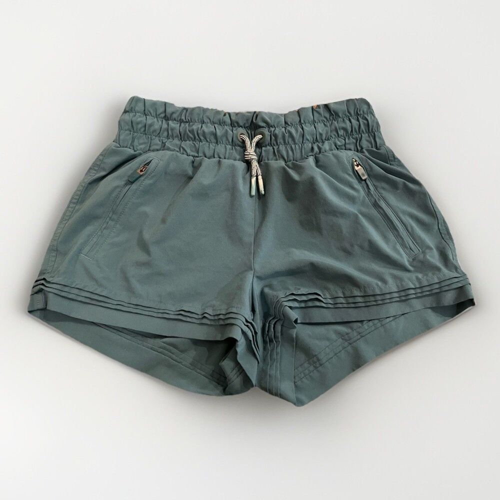 Athleta Girl Road Trippin Shorts Youth Large 12 Teal Pull On Zip Pocket Stretch